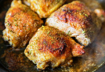 Chicken on frying pan