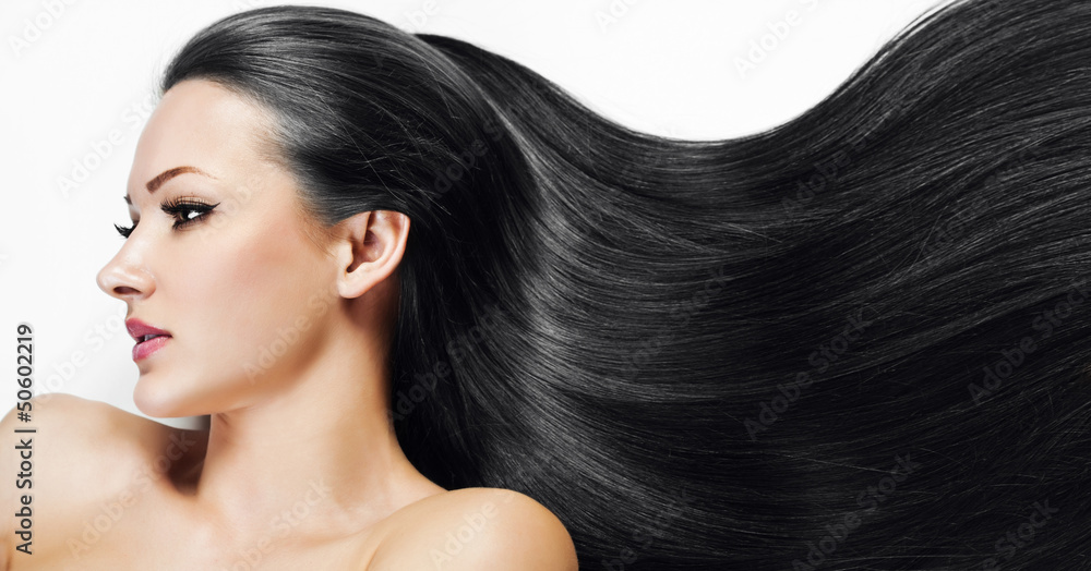 Wall mural beautiful girl. healthy long hair