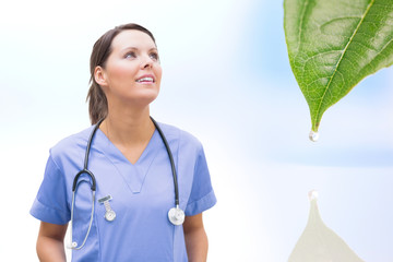 Nurse looking up happily