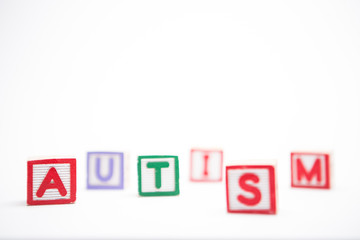 Obraz premium Autism spelled out in letter blocks