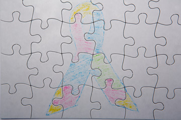 Crayon drawing of autism and aspergers ribbon