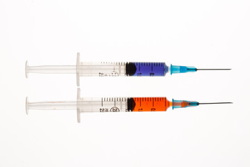 Fototapeta premium Two syringes beside each other