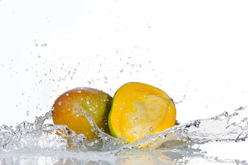 Avocado fruit with water splashes