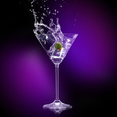 martini drink over dark background