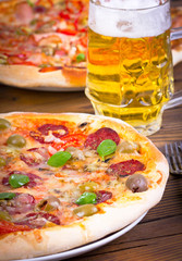 Two pizza and beer
