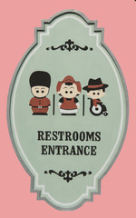 Restroom entrance sign isolated on pink background