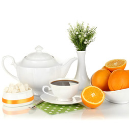 Beautiful white dinner service with oranges isolated on white