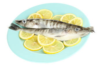 Fresh fish with lemon on plate isolated on white