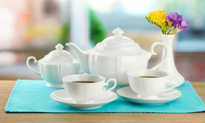 Naklejka na ściany i meble Piękne herbata na drewnianym stole