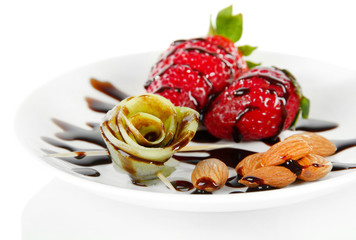 Fruit in chocolate isolated on white