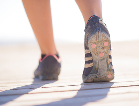 Close-up Of Female Legs Jogging