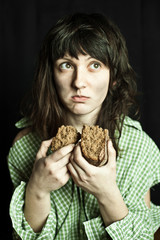 beggar woman eating bread
