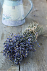 Bunch of dry lavender over wood background