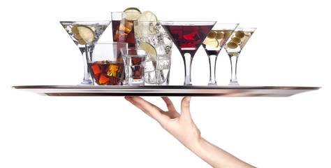 different alcohol drinks on a tray