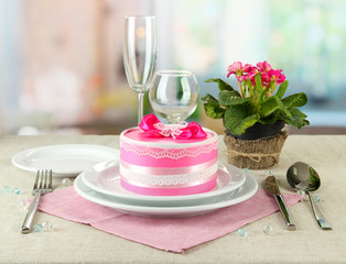 Romantic table serving on bright background