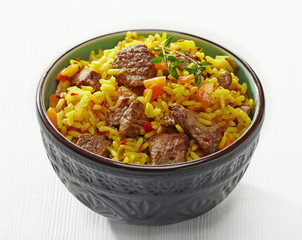 Uzbek national dish plov in a bowl