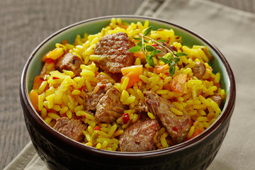 Uzbek national dish plov in a bowl