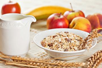 Bowl of muesli for breakfast with fruits