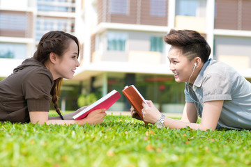 Studying on campus lawn