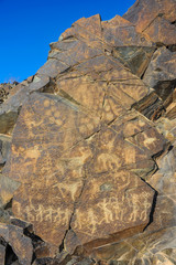Obraz na płótnie Canvas Petroglyphs on the stone