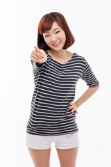 Fototapeta premium Young Asian woman pointing you