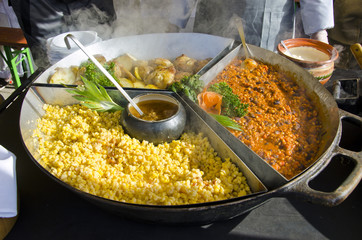 big plate with hot food in  agriculture market