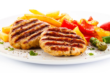 Grilled steak, French fries and vegetables