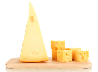 Cut cheese on wooden board isolated on white