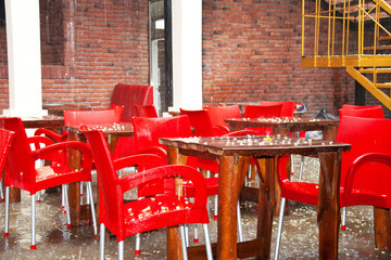 Sidewalk cafe in a rainy day