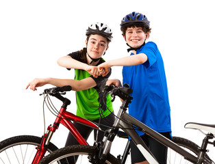 Obraz premium Cyckists - boy and girl isolated on white background