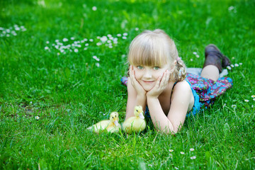 Girls play with duck