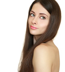 Fototapeta premium Beauty girl with health long hair looking back calm isolated on