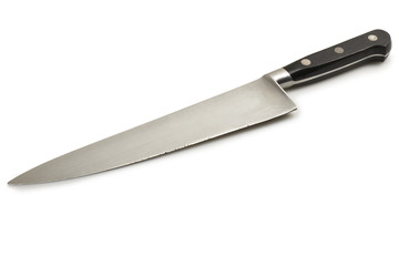 close up of a used knife on white background