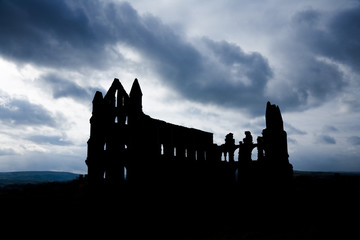 Obraz premium Silhouette of Whitby Abbey with Moody Sky