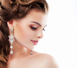 Aristocratic Lady with Diamond Earrings. Femininity