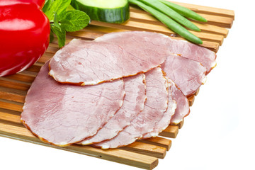 Ripe fresh ham with vegetables