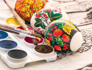 religious spring easter egg painted watercolor brush closeup