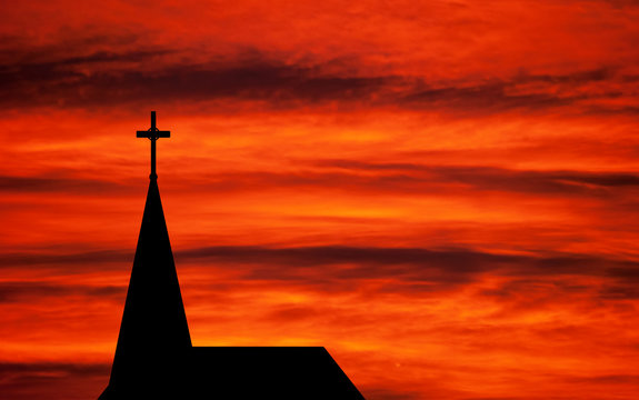 Church spire - religious church building silhouetted
