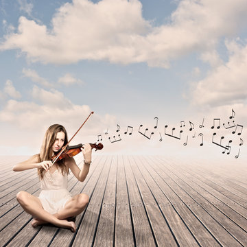 little girl playing violin