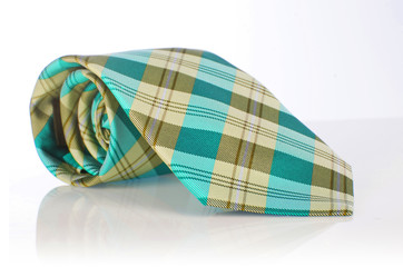 Elegant silk male tie ( necktie ) on white