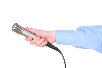 Male hand with microphone isolated on white