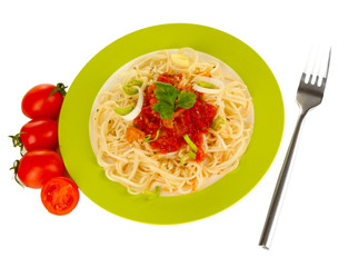 Diet soup with vegetables in pan on wooden table close-up
