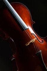 Fototapeta premium Violin in dark room - music concept