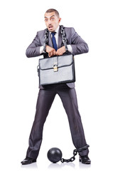 Businessman with shackles on white