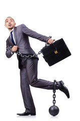 Businessman with shackles on white