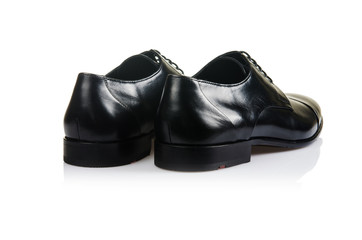 Fashion concept with male shoes on white