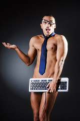 Businessman in   pants with keyboard
