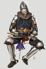 Fearless knight is having relaxation after the battle