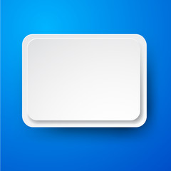 Paper white rectangular note on blue.