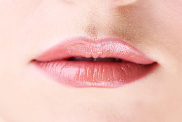 Fototapeta premium Beautiful make up of gloss lips, close up